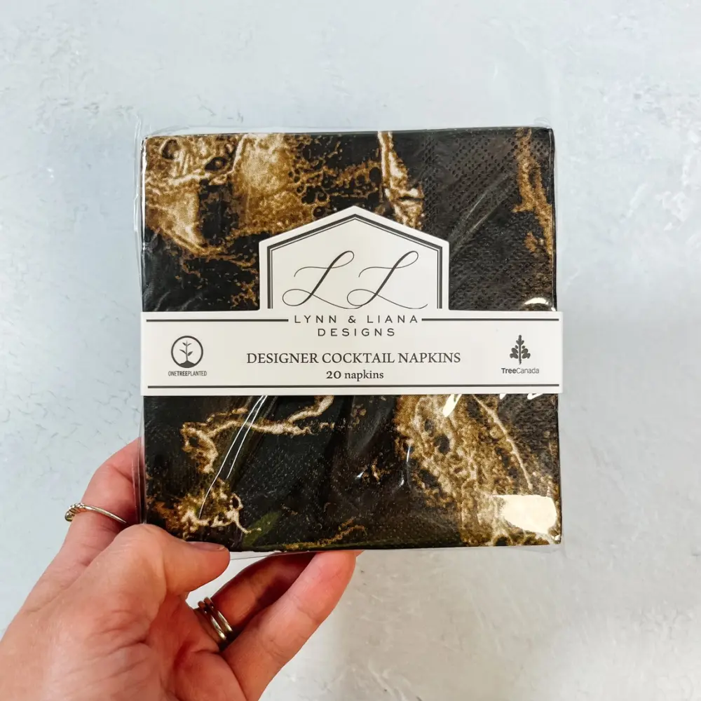Frauegschichte - Lynn & Liana Designs Cocktail-Serviette: schwarz-gold