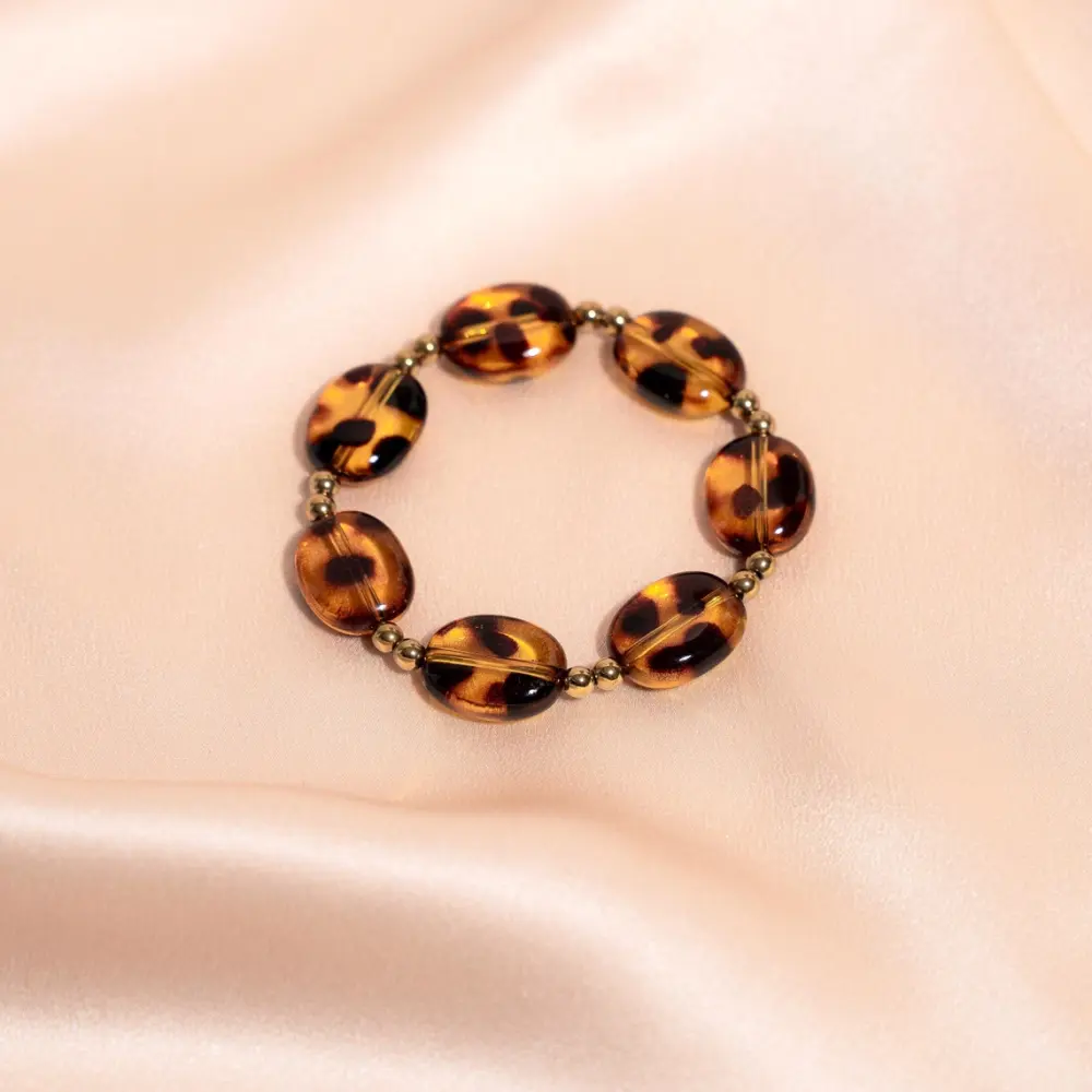 Frauegschichte - Meora Paris Armband Leopard mit Bernstein-Optik