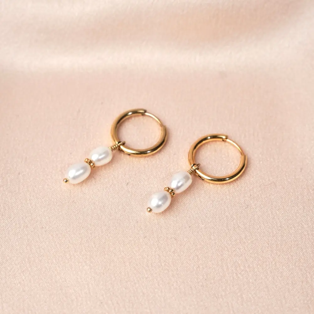 Meora Paris Ohrringe mit Süsswasser-Perlen Frauegschichte - Meora Paris Ohrringe mit Süsswasser-Perlen