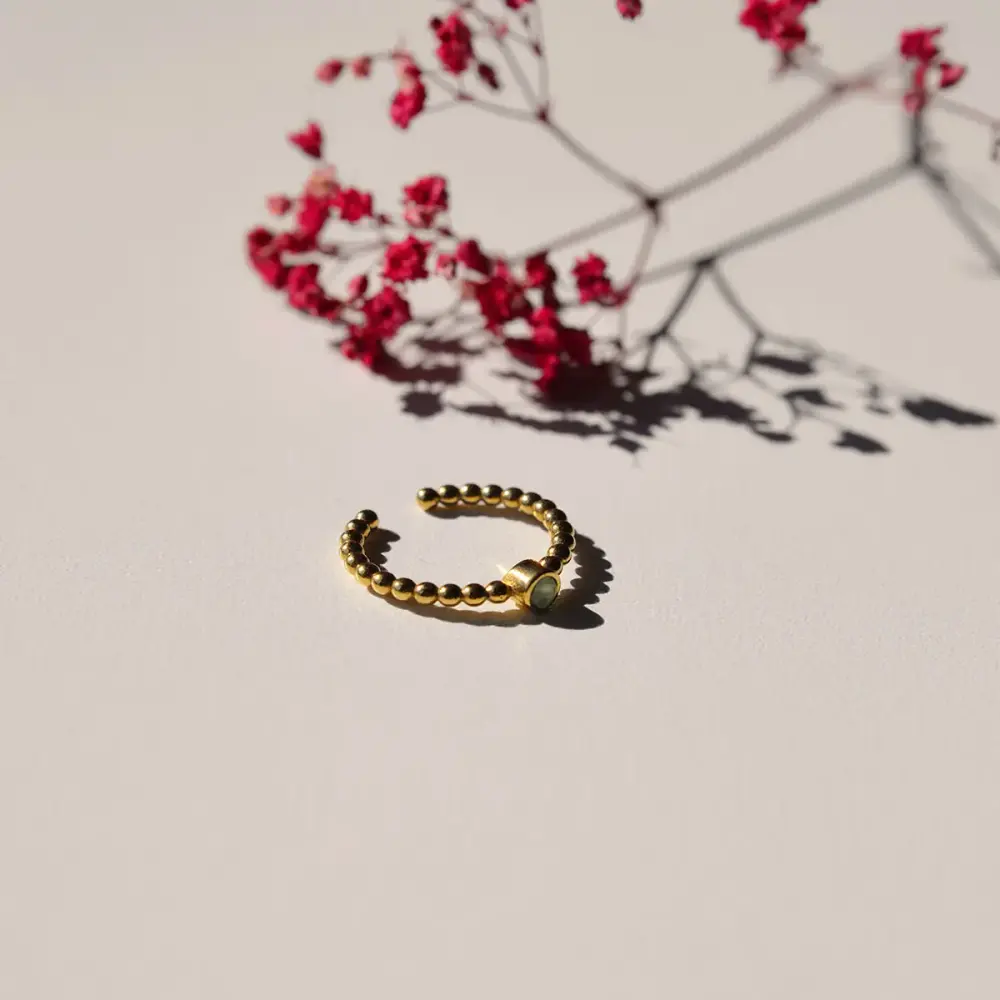 Frauegschichte - Vinoos Single-Ring gold - grüner Stein